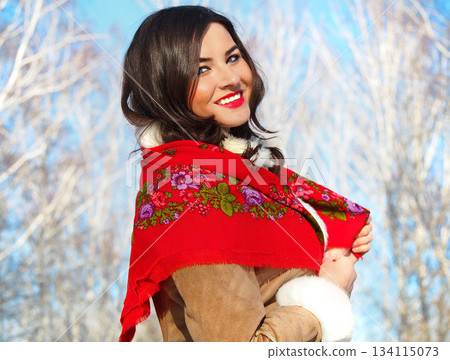 Russian girl, beauty against the backdrop of a winter landscape. Russian-folk girl portrait photo Russian girl, beauty against the backdrop of a winter landscape. Russian-folk girl portrait photo 134115073
