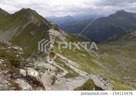 View at Sankt Antonier Joch shows Riedkopf mountain from Smugglerpfad trail in Gargellen, Vorarlberg, Austria during daytime View at Sankt Antonier Joch shows Riedkopf mountain from Smugglerpfad trail in Gargellen, Vorarlberg, Austria during daytime 134115476