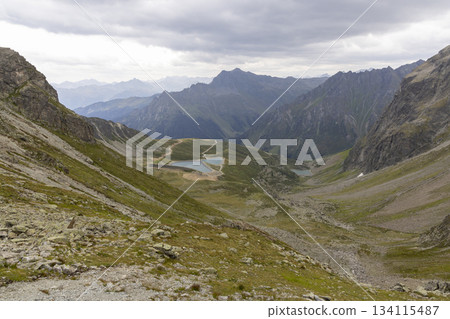 Hiking the Smugglerpfad trail in Gargellen, Montafon, Vorarlberg, Austria with views of mountains and valleys 134115487