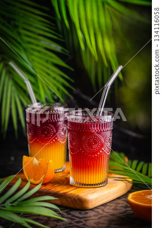 Closeup glass of cocktail with orange juice and red wine Closeup glass of cocktail with orange juice and red wine 134116058