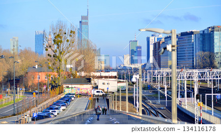 Warsaw, Poland. 28 November 2025. A panorama of the city with skyscrapers. In the foreground are high-voltage cables for electric trains at Warszawa Zachodnia station. 134116178