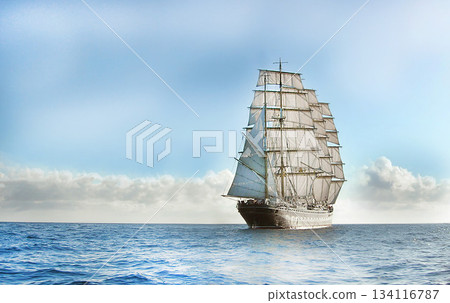 Large sailing ship navigating calm ocean under cloudy sky Large sailing ship navigating calm ocean under cloudy sky 134116787