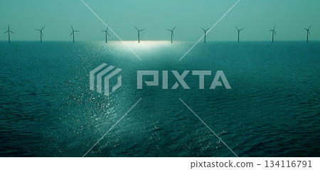 Beautiful and Tranquil Seascape Featuring Wind Turbines at Dusk 134116791
