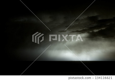 A Dramatic Stormy Seascape Unfolds Under Ominous Dark Clouds 134116821