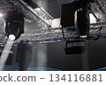 lighting fixtures hanging on truss over the stage 134116881