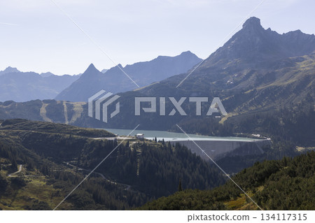 View of Stausee Kops in Gaschurn Montafon Vorarlberg Austria surrounded by mountains during daylight 134117315