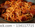 spaghetti with meatballs, in tomato sauce, cooking in a frying pan, no people, homemade, 134117715