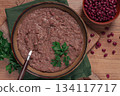 Red bean lobio,a traditional Georgian dish, on a wooden table, homemade, 134117717