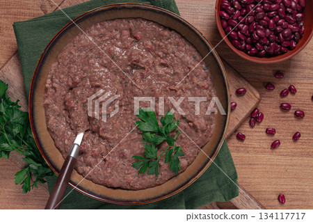 Red bean lobio,a traditional Georgian dish, on a wooden table, homemade, Red bean lobio,a traditional Georgian dish, on a wooden table, homemade, 134117717