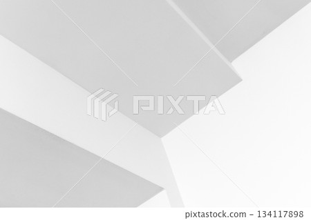 A stark, abstract composition of interlocking white planes and clean lines A stark, abstract composition of interlocking white planes and clean lines 134117898