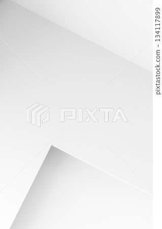 A serene, vertical high-key minimalist image featuring clean white planes 134117899