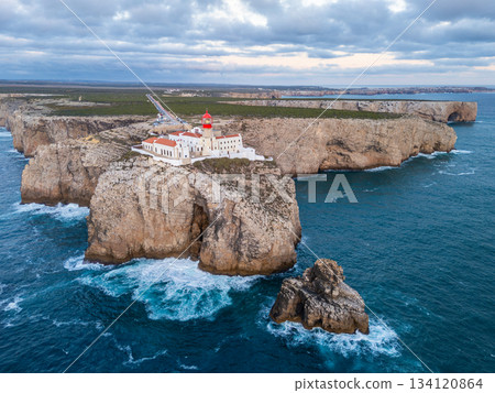 Cape Saint Vincent, Lighthouse and Atlantic Ocean in Evening. Aerial View. Algarve, Portugal Cape Saint Vincent, Lighthouse and Atlantic Ocean in Evening. Aerial View. Algarve, Portugal 134120864