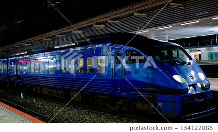 JR Kyushu's limited express Sonic train departing from Hakata Station at night JR Kyushu's limited express Sonic train departing from Hakata Station at night 134122086