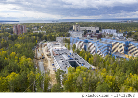 Aerial view of Novosibirsk University, forests in autumn, Ob river, construction of new buildings Aerial view of Novosibirsk University, forests in autumn, Ob river, construction of new buildings 134122868