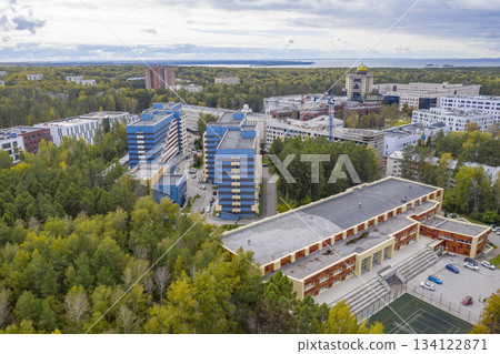 Aerial view of Novosibirsk University, forests in autumn, Ob river, construction of new buildings 134122871