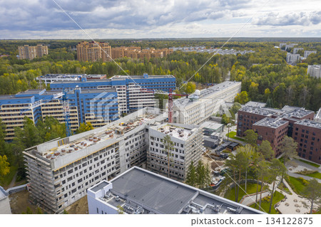 Aerial view of Novosibirsk University, forests in autumn, Ob river, construction of new buildings Aerial view of Novosibirsk University, forests in autumn, Ob river, construction of new buildings 134122875