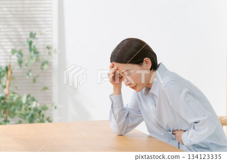 A woman with poor health A woman with poor health 134123335