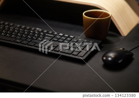 Computer desk keyboard and mouse at night 134123380