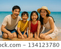 Family having fun on the beach 0161 134123780