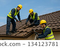 Workers repairing the roof 0162 134123781