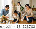 Family relaxing in the living room. Cleaning time with family cooperation. 0163 134123782