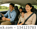 Family driving - Family smiles and driving 0164 134123783