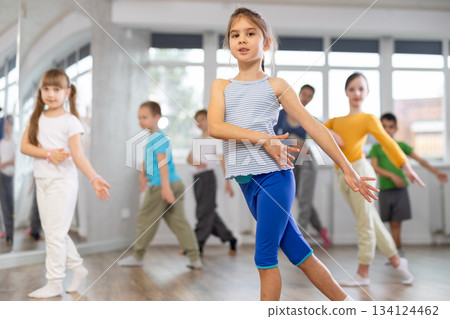 Group of children dancing contemporary dance Group of children dancing contemporary dance 134124462