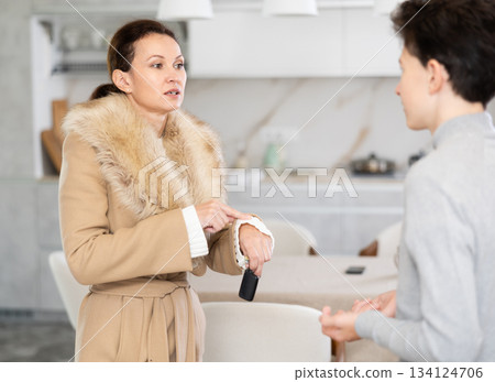 Mother leaving house, son staying home 134124706