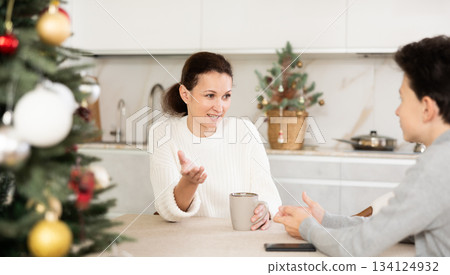 Mother and son discussing something 134124932