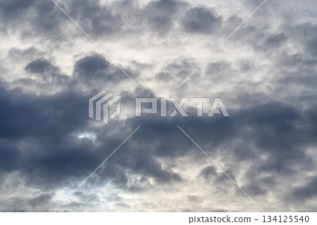 An Overcast Sky Filled with Dramatic and Intricate Cloud Patterns Across the Horizon An Overcast Sky Filled with Dramatic and Intricate Cloud Patterns Across the Horizon 134125540
