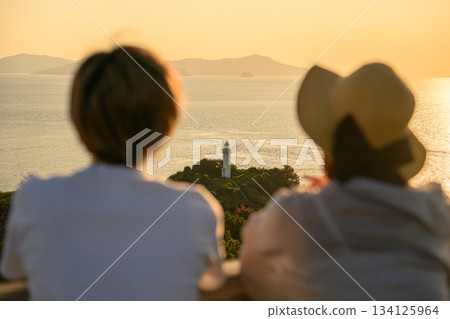 Lighthouse and sunset 134125964