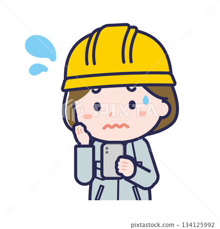 A female "construction worker" using a smartphone A female "construction worker" using a smartphone 134125992