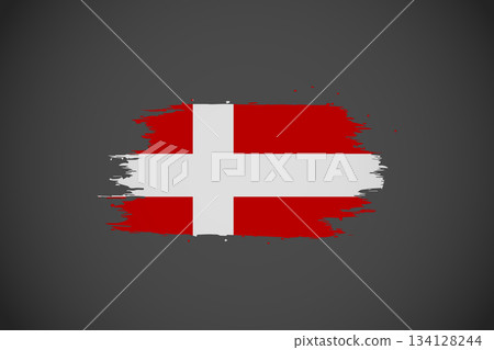 Denmark National Flag Grunge Brush Stroke Graphic: Artistic Dannebrog Banner on Dark Background. Denmark National Flag Grunge Brush Stroke Graphic: Artistic Dannebrog Banner on Dark Background. 134128244
