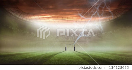 Rugby-style goalposts are being struck by lightning in flat stadium design with misty grass field 134128653