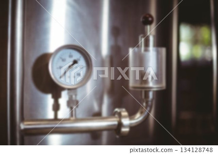 Pressure gauge on manufacturing equipment Pressure gauge on manufacturing equipment 134128748
