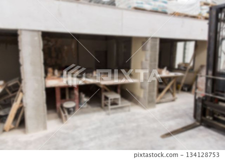 Flat design illustration is showing wooden workbench with tools and paint cans in construction site 134128753