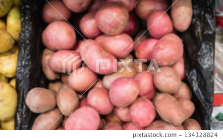Sweet potatoes in crate at market Sweet potatoes in crate at market 134128824