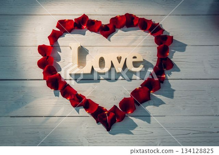 Heart shape frame with red roses petals Heart shape frame with red roses petals 134128825