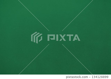 Uniform green field being displayed in flat design, creating vibrant monochromatic backdrop Uniform green field being displayed in flat design, creating vibrant monochromatic backdrop 134128899