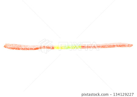 sour strawberry candy belts isolated on white bakground sour strawberry candy belts isolated on white bakground 134129227