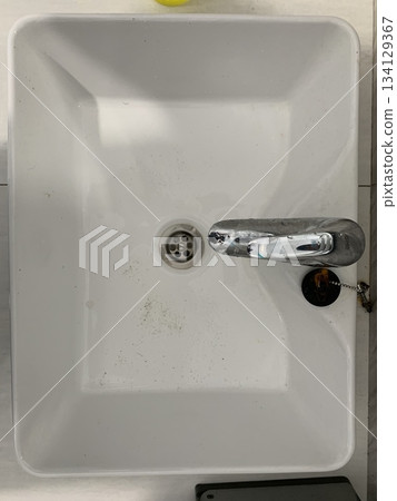 faucet in the bathroom 134129367