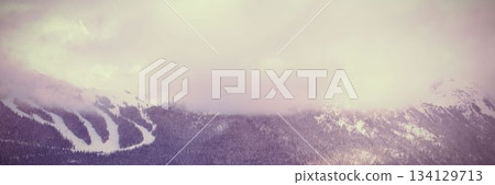 Snow covered mountain during sunset Snow covered mountain during sunset 134129713