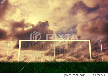 Football goal under cloudy sky Football goal under cloudy sky 134129721