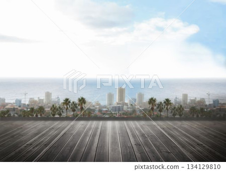 Flat design wooden deck flooring is featuring palm trees, city skyline and ocean under clouds 134129810
