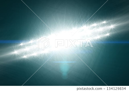 Abstract art is featuring starburst lens flare beams streaming across deep teal gradient background Abstract art is featuring starburst lens flare beams streaming across deep teal gradient background 134129834