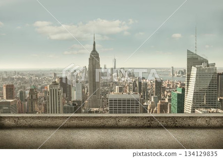 Empire State Building is dominating flat design skyline and concrete parapet, clouds and waterfront 134129835