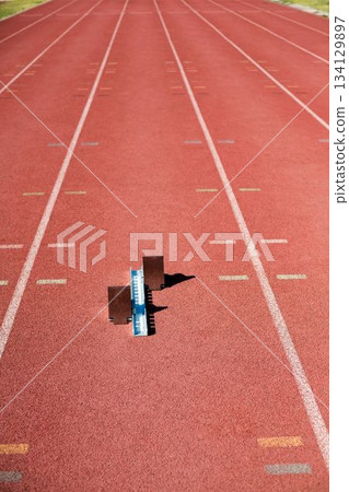 High angle view of track starting block on field 134129897