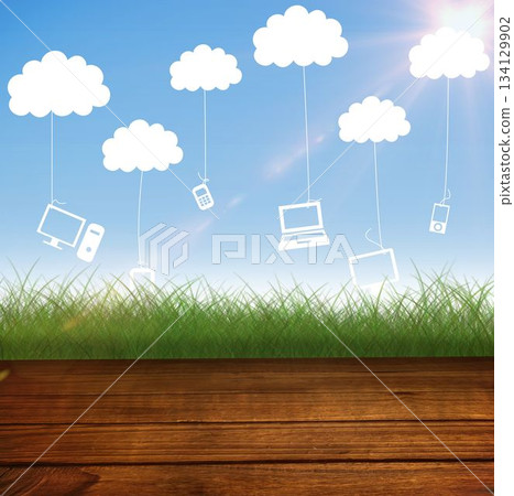 Flat design showing deck touching grass under blue sky, cloud icons tethering device silhouettes 134129902