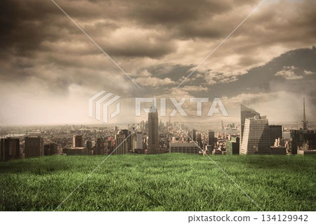 Digital composite of Stormy sky over city 134129942