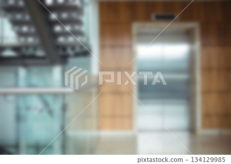 Defocused image of lift in modern office Defocused image of lift in modern office 134129985